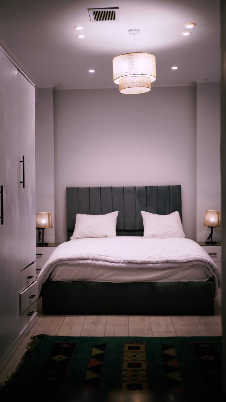 Textured ceramic vase reflecting warm light