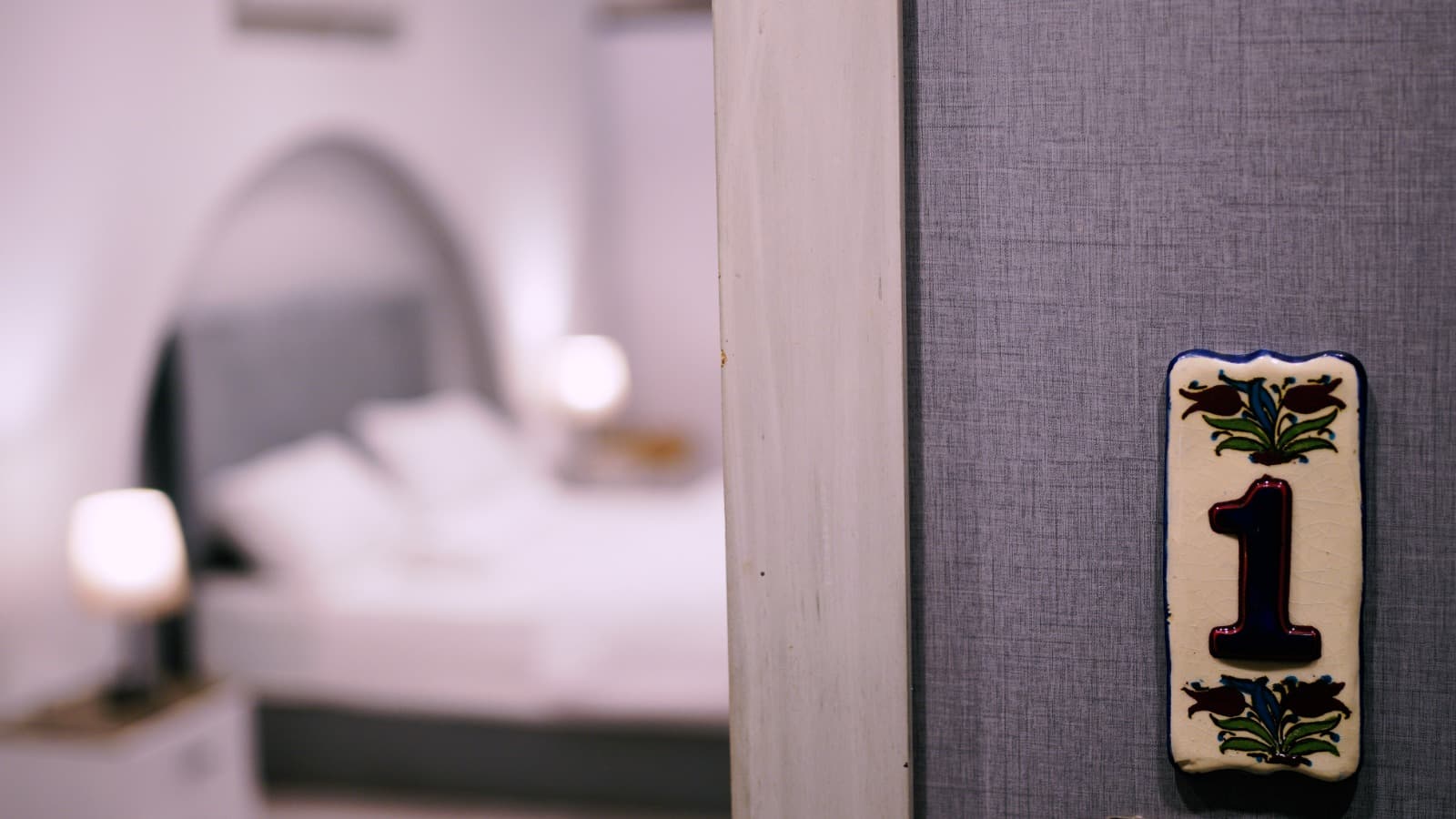 Hand-painted ceramic room number — Room 1