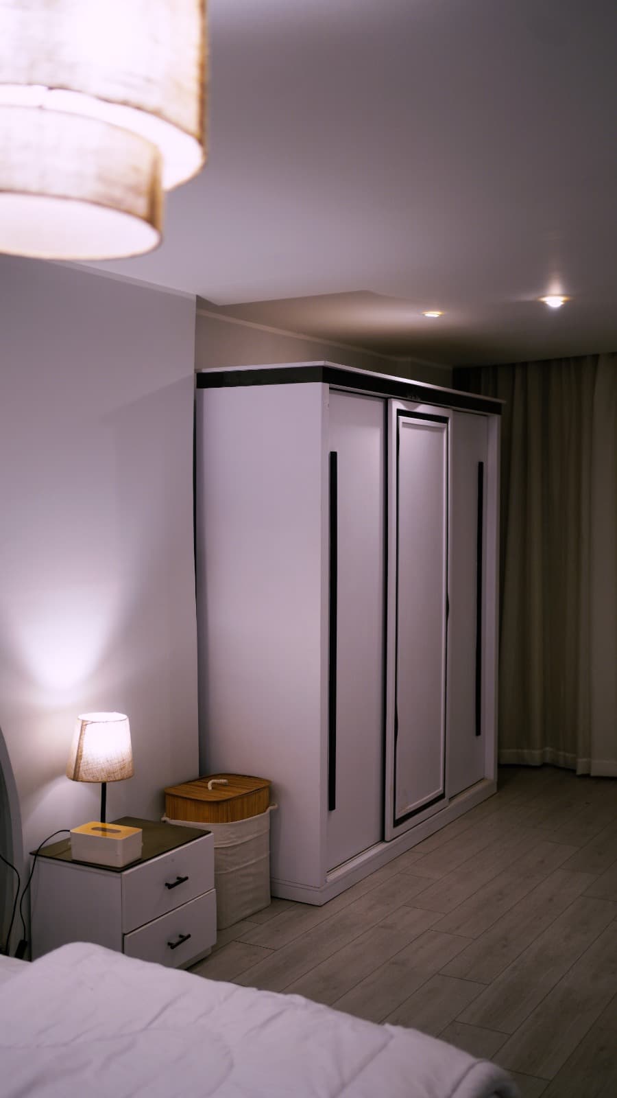 Warm shadowed archway leading to private suite