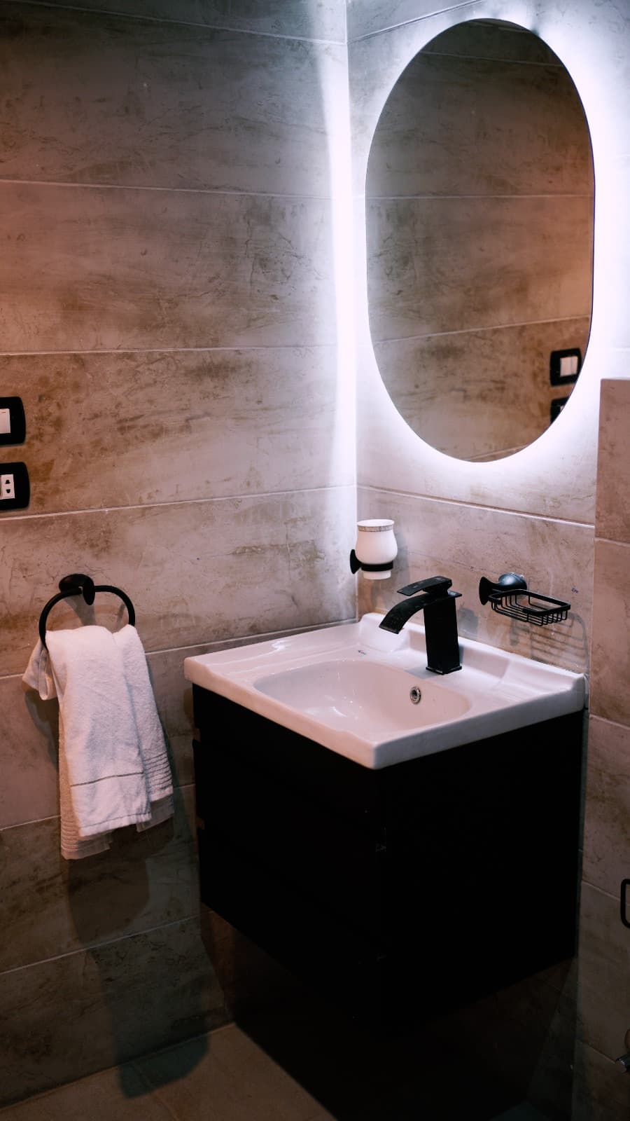 Glowing staircase with arched door beyond